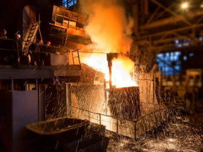 Liquid steel is pouring to the ladle from induction furnace - Judian