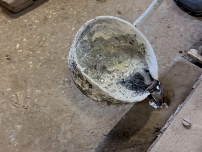 Molten aluminium in a crucible before pouring during the casting process